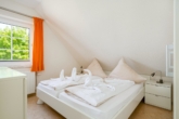 Schlafzimmer - Attraktive Obergeschosswohnung in Greetsiel!