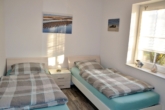 Schlafzimmer 2 - Attraktive Erdgeschosswohnung in Greetsiel