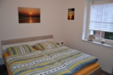 Schlafzimmer 1 - Attraktive Erdgeschosswohnung in Greetsiel
