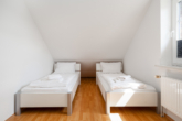 Schlafzimmer 3 im OG - Gemütliches Friesenhaus in Sackgassenlage von Norden!