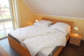 Schlafzimmer OG - RESERVIERT! Maritimes Wohnen am Siel – Maisonette in Greetsiel