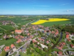 Luftbild vom Grundstück - Neubau-Ferienhaus am Wasser bei Greetsiel!